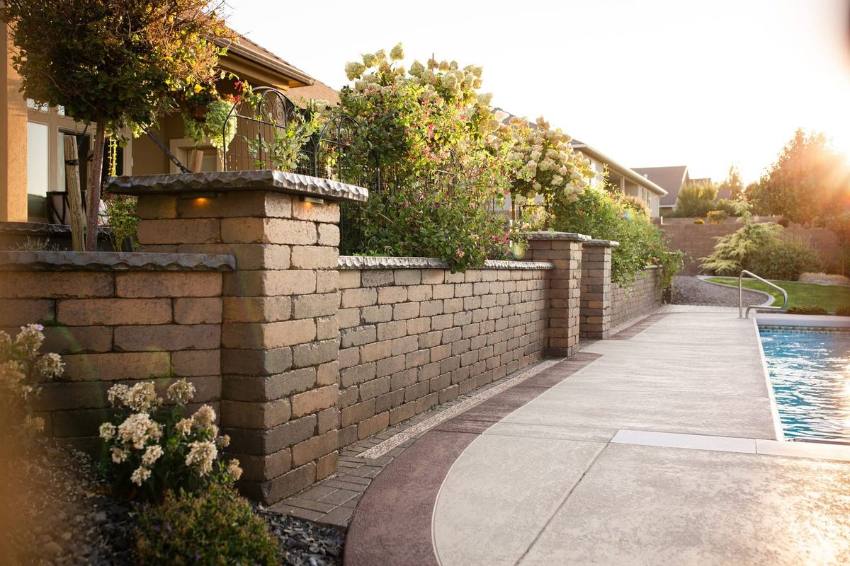 Fresh landscape installation with new beds, edging, and turf